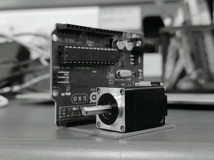 A camera sitting on top of a wooden table